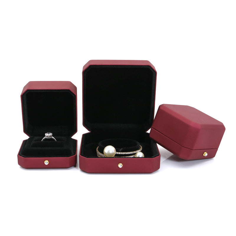 Red leather octagonal style jewellery box with gold dot BL560